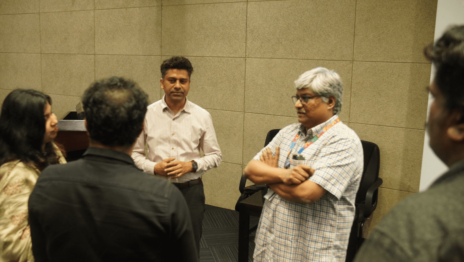 Mr. Srinivasan interacting with Shri. Vasanth Varada, AGM, Customer Relationships, and other Technopark officials.