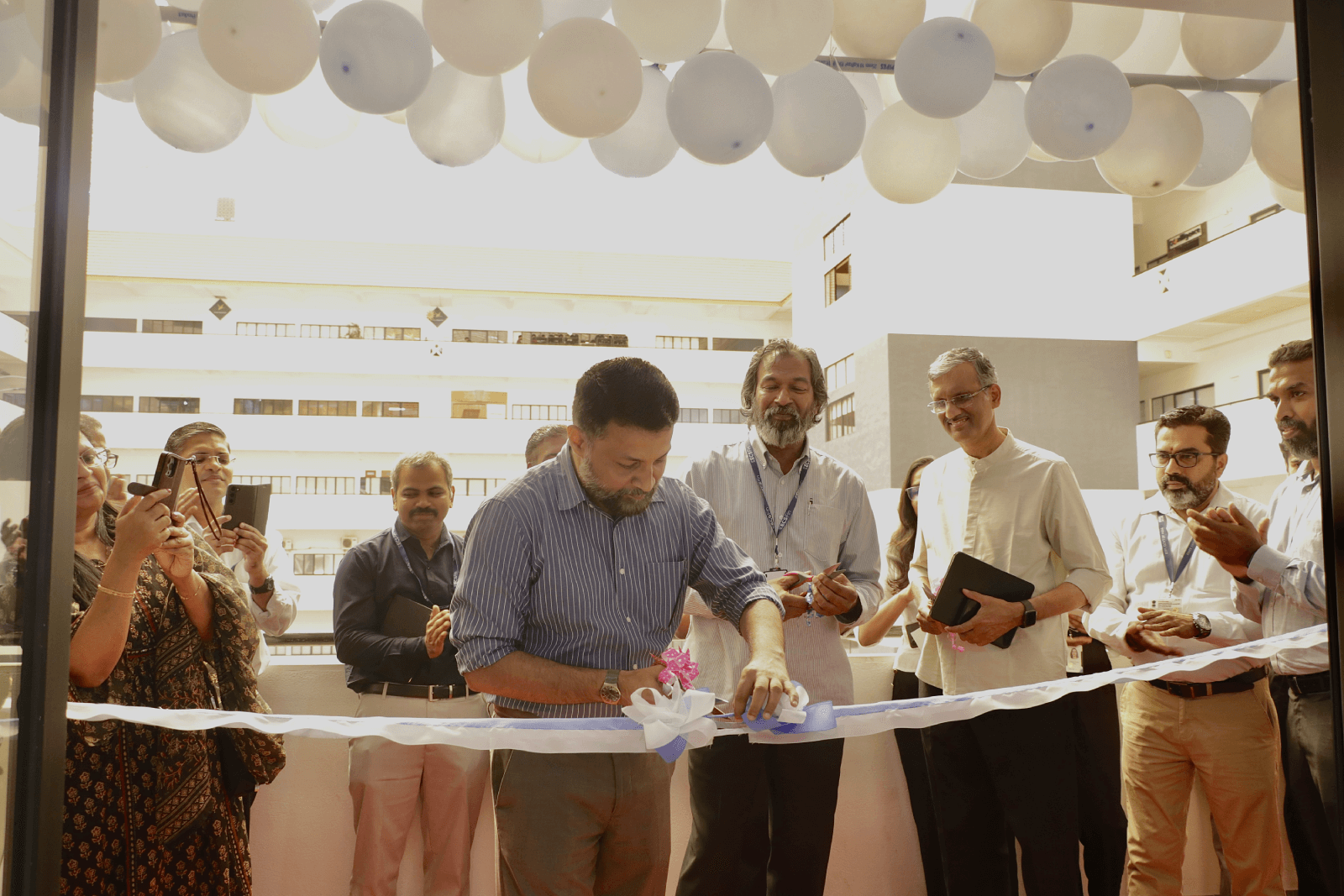 CEO, Technopark, Col Sanjeev Nair (Retd.) inaugurating the ECS Fin office at Nila building, Technopark Phase I.