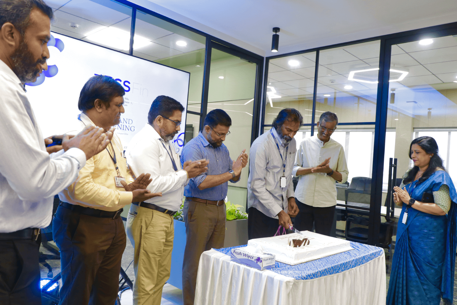 The celebrations begin with a cake cutting at the new ECS Fin office at Technopark.