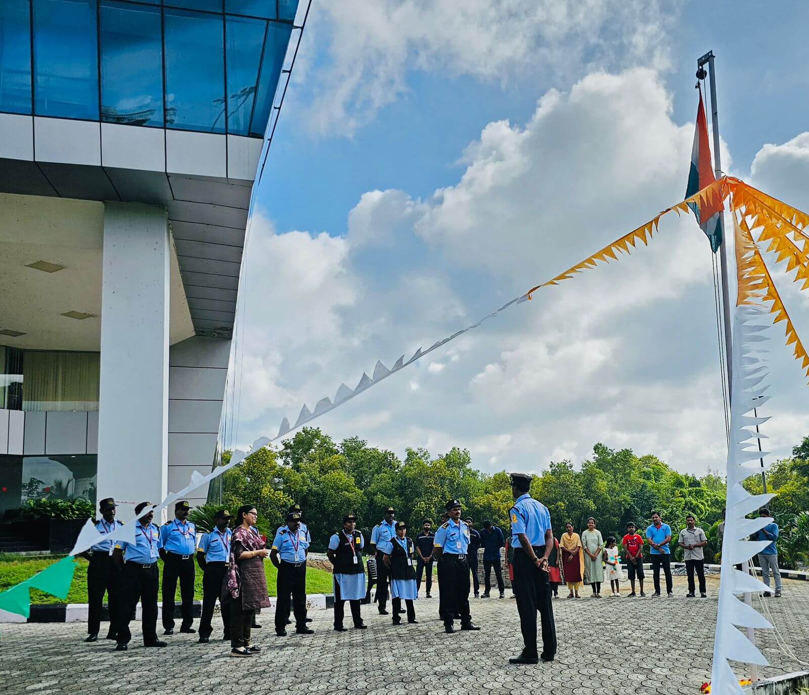 Ms. Jayanthi R, Assistant Officer (Finance & Admin), and staff at the Phase V campus Independence Day celebrations.