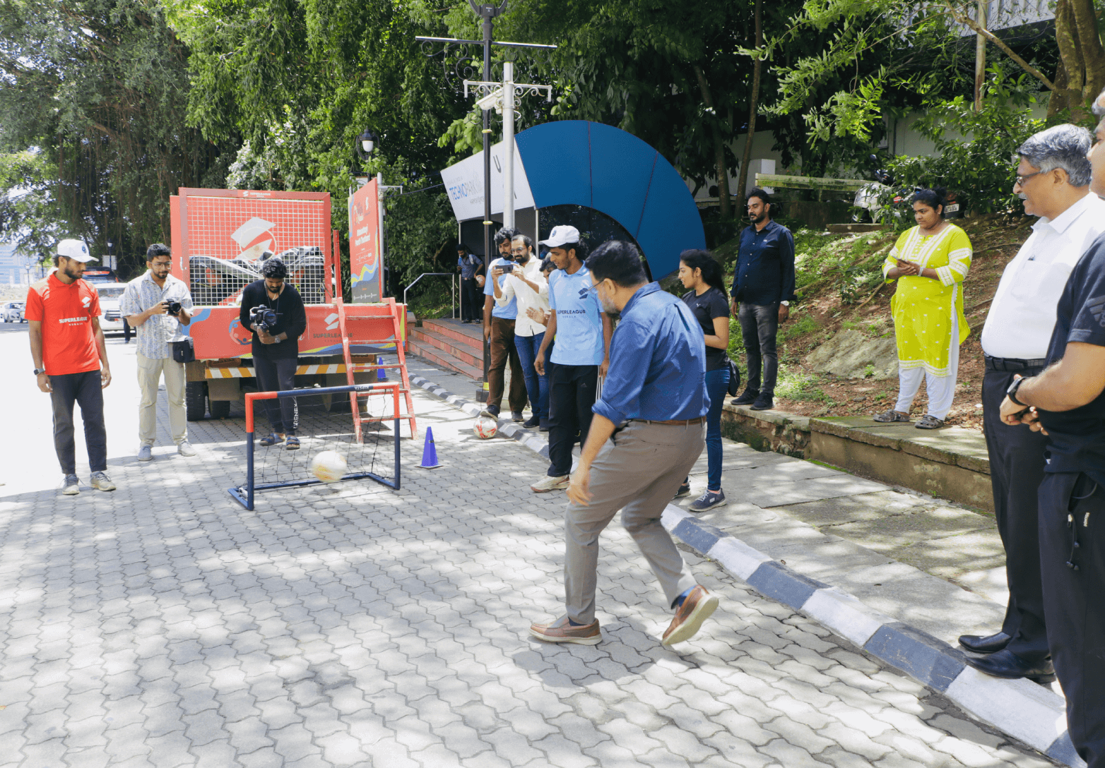 Col Sanjeev Nair (Retd) trying out his football skills at the event.