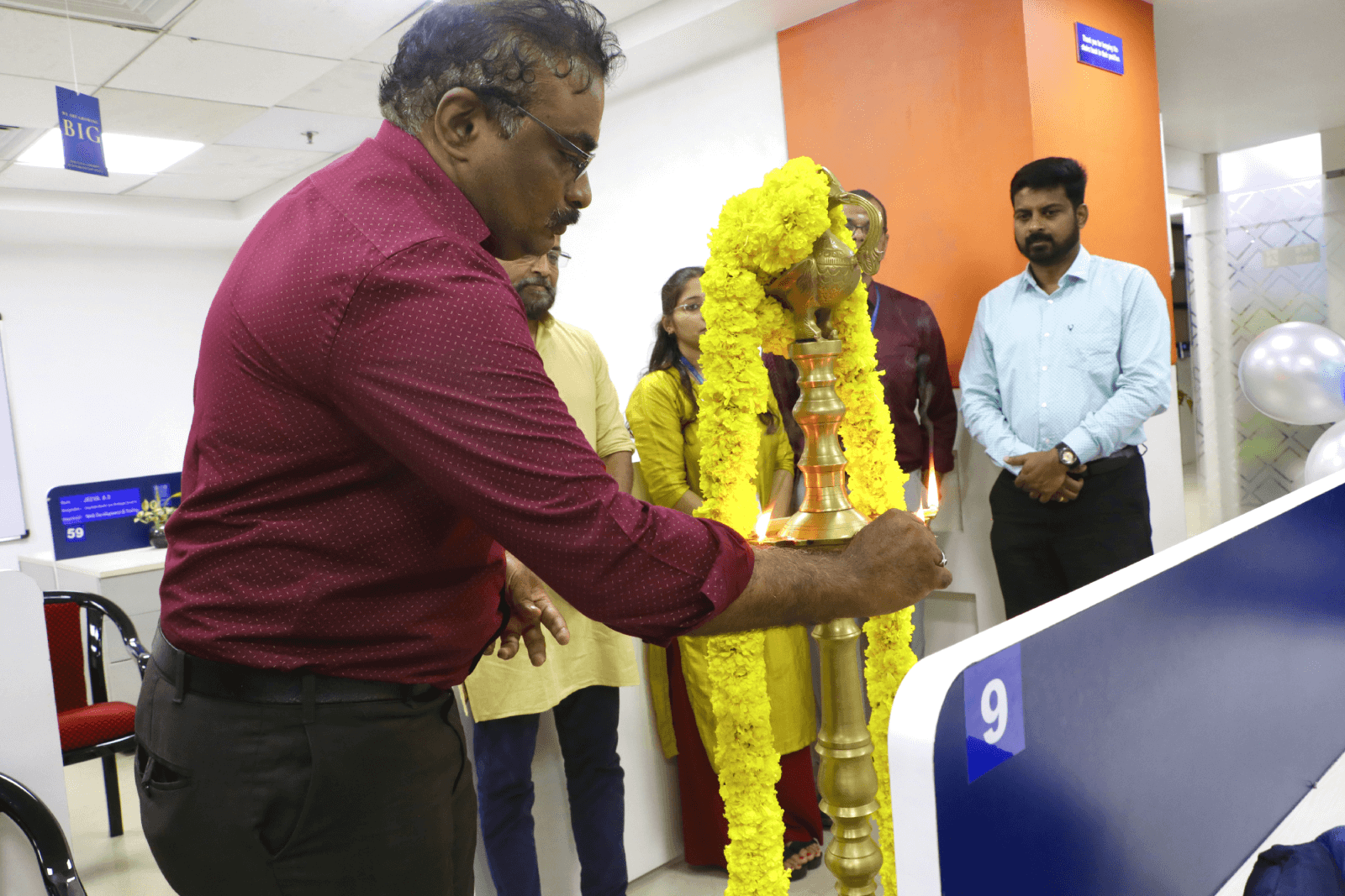 Mr. Unnikrishnan R S, Accounts Manager, Carnival Building, Technopark, lighting the ceremonial lamp.