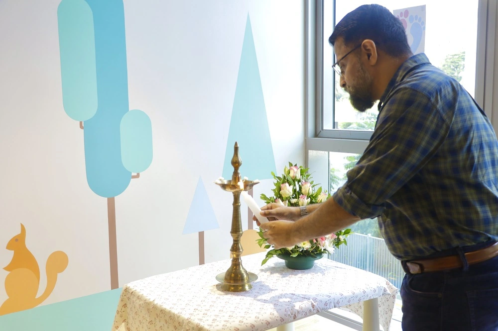 Col Sanjeev Nair (Retd), CEO Technopark, lighting the ceremonial lamp at the launch of Stepping Stones creche and kindergarten by Global Public School at Technopark Phase III.