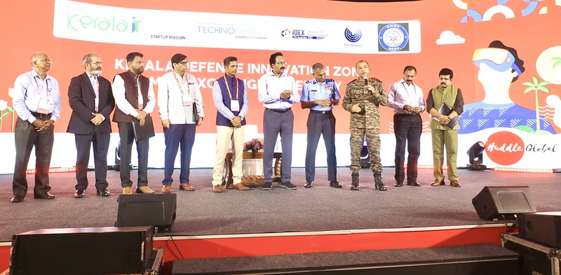 Dignitaries on stage at the MoU exchange.