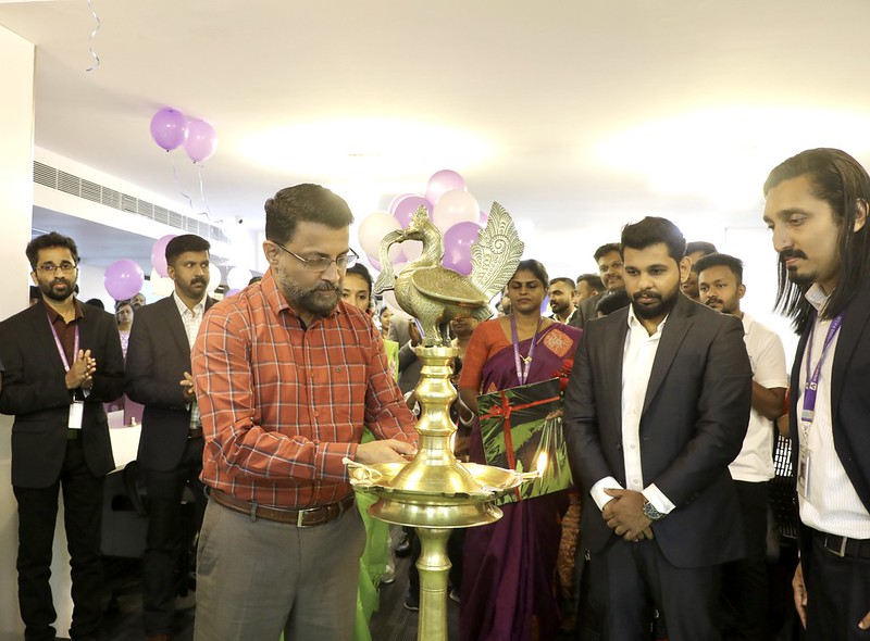 CEO Technopark lighting the inaugural lamp.