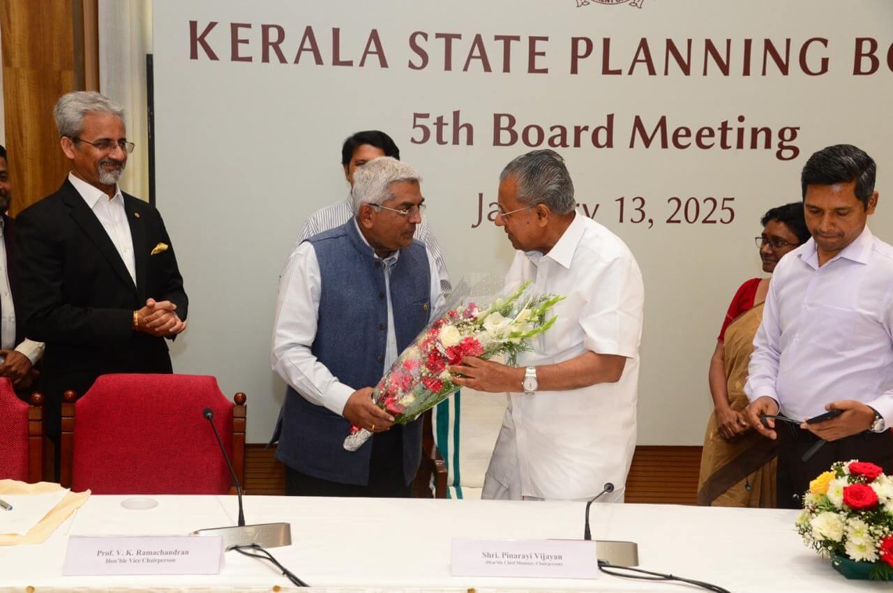 Mr. M. R. Jaishankar, Executive Chairman Brigade Group, hands a bouquet to Shri Pinarayi Vijayan, Kerala Chief Minister.