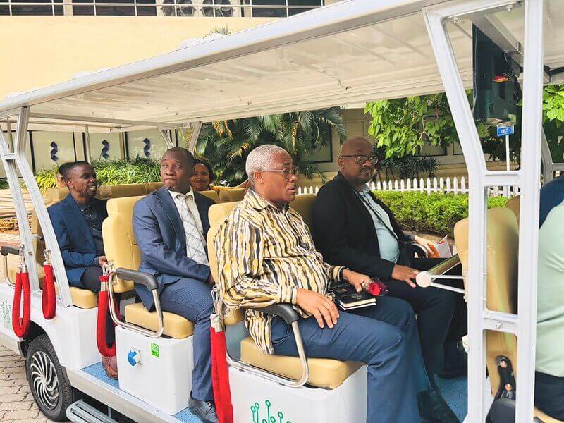 The Tanzanian delegation taking a tour of Technopark on the EV buggy.