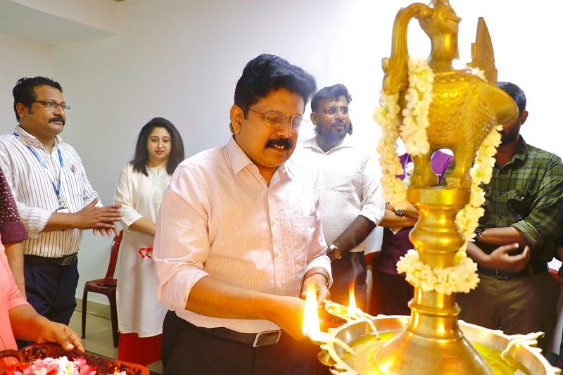 Mr. Anoop Ambika lighting the inaugural lamp.